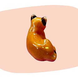 lionceau en céramique, figurine vintage, céramique émaillée, orange nuancé, style années 60-70, décoration rétro, animal décoratif, finition brillante, détails peints à la main, objet artisanal, déco chaleureuse, collection d’animaux, concept store, les filles les meufs, garrigues sainte Eulalie, uzes